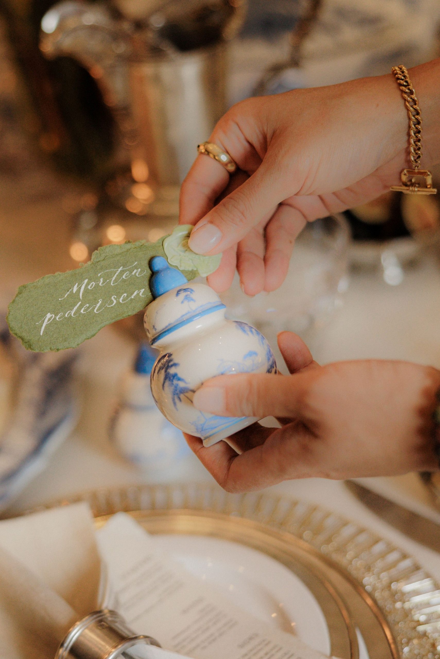 A blue and white Juliska ceramic place card holder