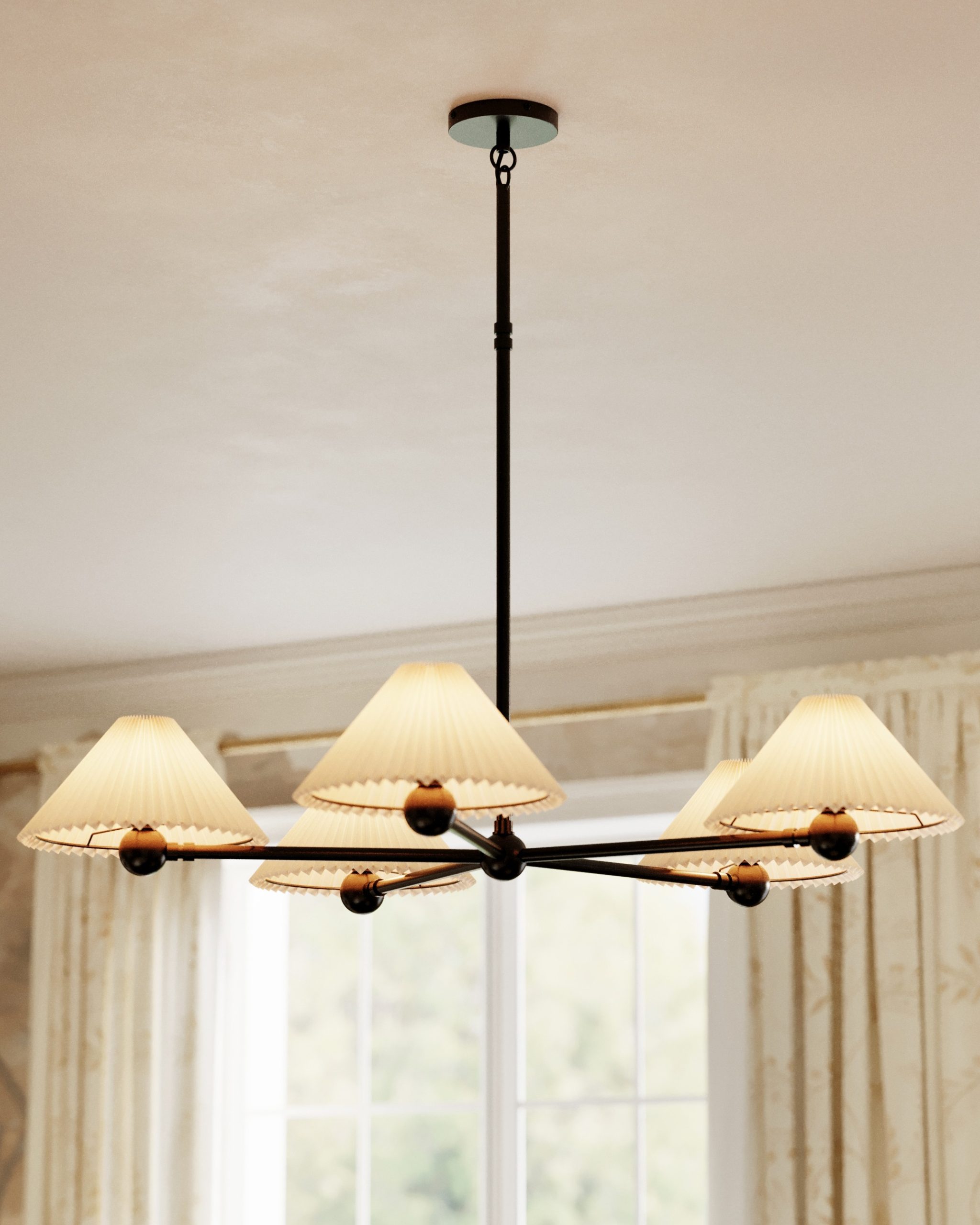 black metal chandelier with five pleated lamp shades